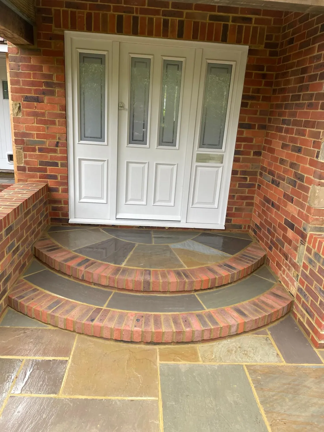Brick entrance steps by Johnson Construction