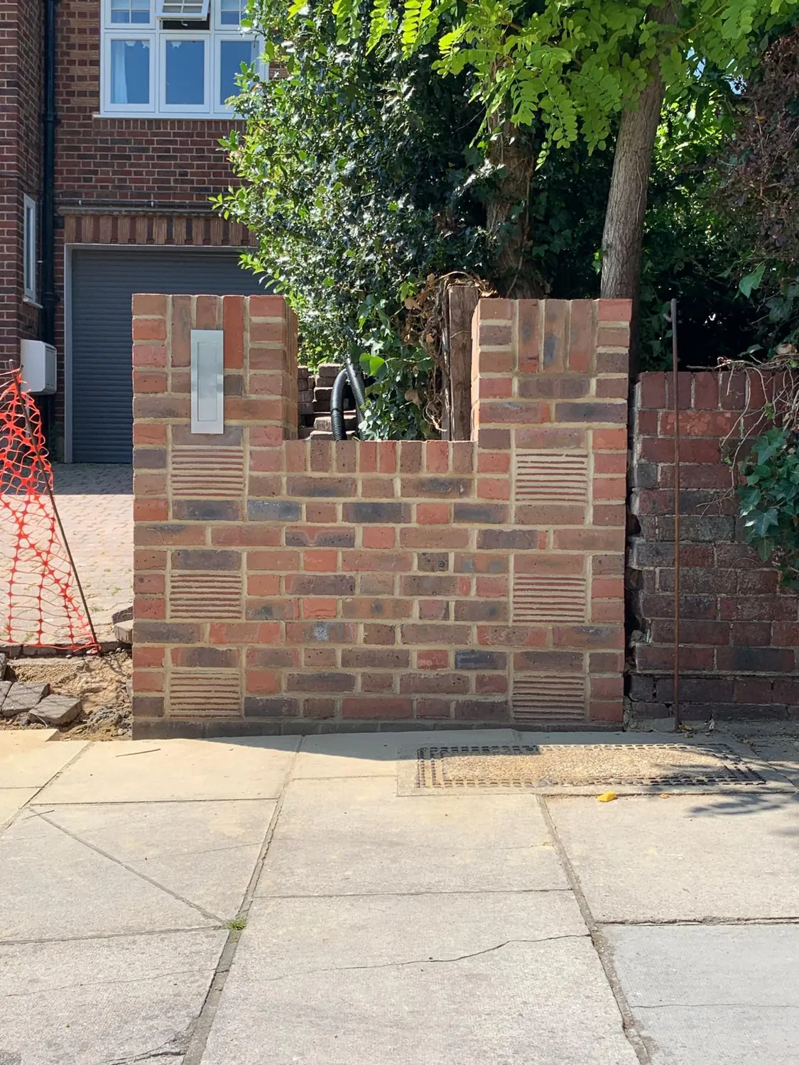 New brick wall and pier by Johnson Construction