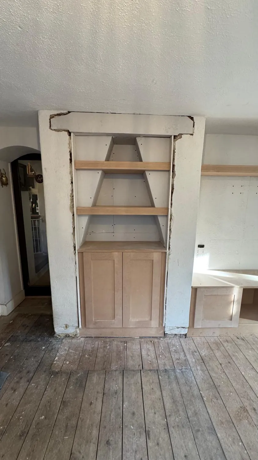 Built-in timber shelving by Johnson Construction