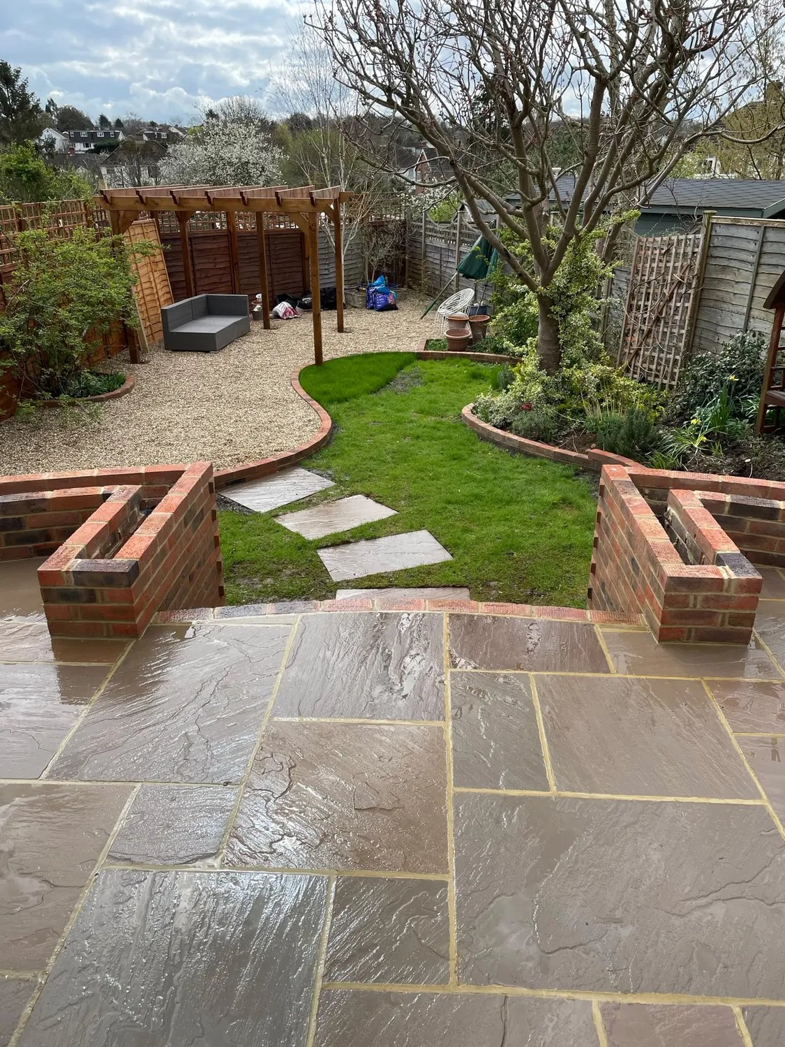 Curved garden path and hard landscaping by Johnson Construction