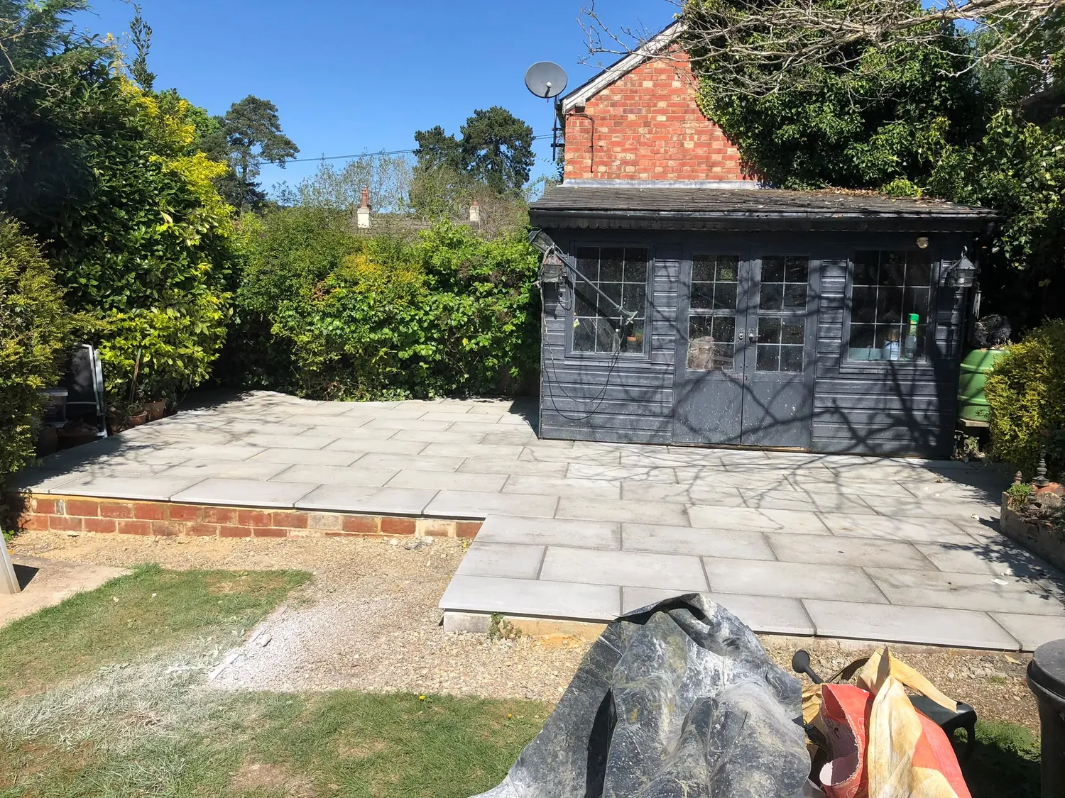 Completed stone patio by Johnson Construction
